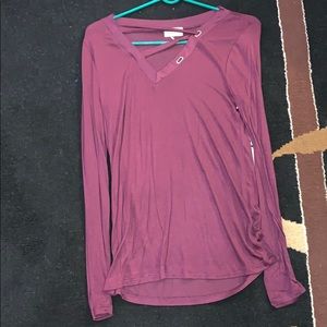 Purple long sleeve blouse.